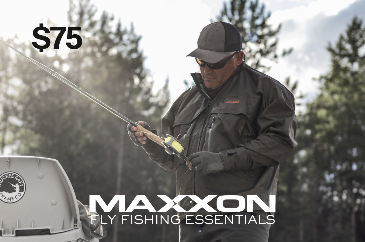 Angler holding black gray Maxxon fishing rod yellow reel handle